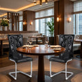 Set of Two Black And Silver Tufted Faux Leather And Metal Dining Side Chairs